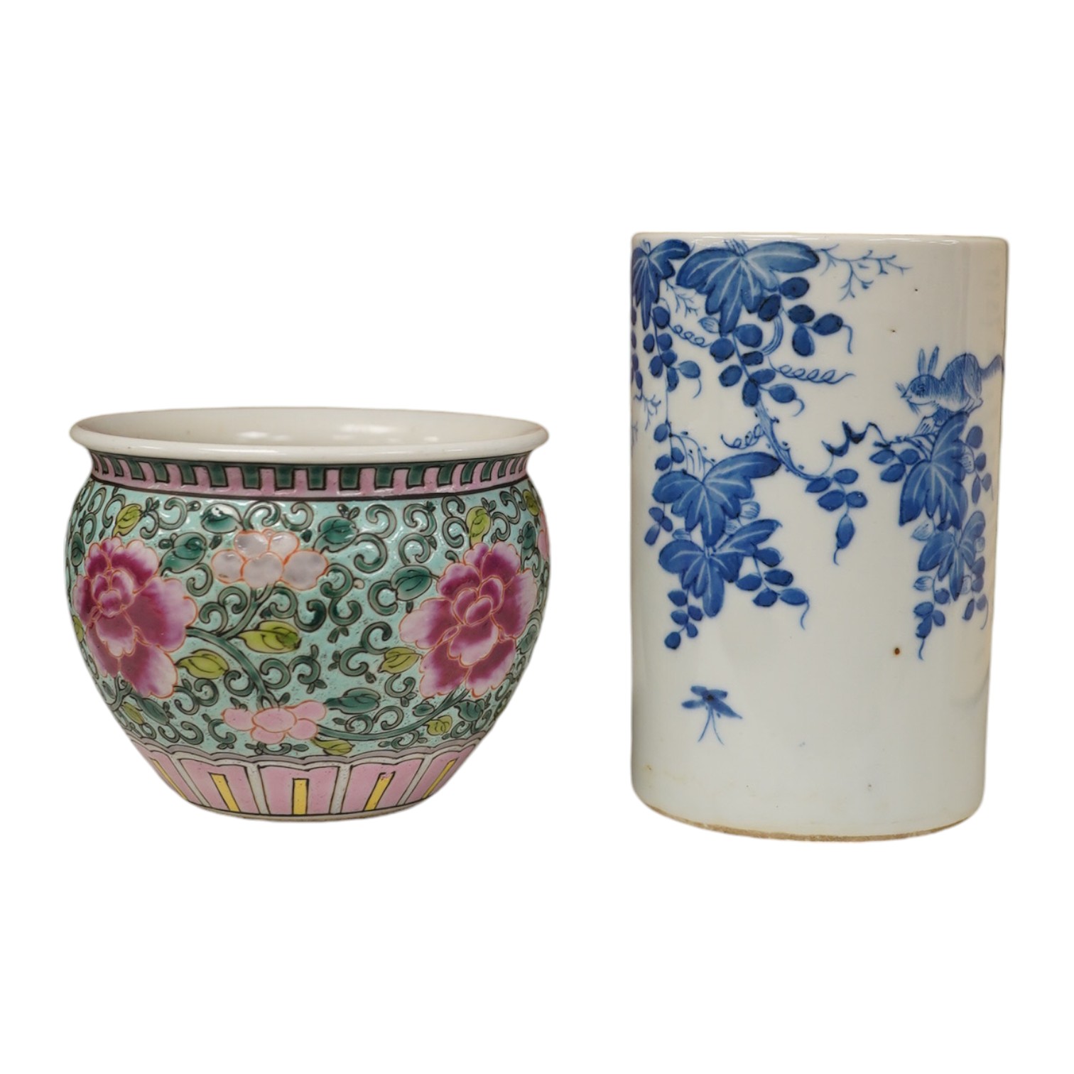 A Chinese blue and white brush pot and famille rose miniature jardiniere, tallest 12cm. Condition - good